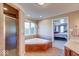 Bathroom with corner jacuzzi tub, walk-in shower, and double vanity at 1957 Cherry Tree Rd, Avon, IN 46123