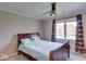 Bedroom with a double bed and large window with curtains at 1957 Cherry Tree Rd, Avon, IN 46123