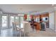 Modern kitchen with island, stainless steel appliances, and breakfast area at 1957 Cherry Tree Rd, Avon, IN 46123