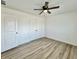 Spacious bedroom featuring hardwood floors and double door closets at 1441 Coen Ct, Columbus, IN 47201