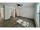 Bright bedroom with wood-look floors and an ensuite bathroom at 1441 Coen Ct, Columbus, IN 47201