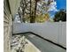 Small, fenced-in backyard with a concrete patio at 1441 Coen Ct, Columbus, IN 47201