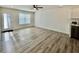 Living room with wood-look floors and plenty of natural light at 1441 Coen Ct, Columbus, IN 47201