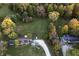 Aerial view of property with large yard, showing house and outbuildings at 3231 W State Road 32, Westfield, IN 46074