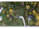 Aerial view showcasing a house and surrounding landscape with fall foliage at 3231 W State Road 32, Westfield, IN 46074