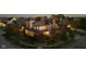 Two-story house with warm lighting, showcasing inviting interior at 7189 Lockford N, Avon, IN 46123