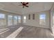 Spacious main bedroom with carpeting, tray ceiling and private deck access at 7189 Lockford N, Avon, IN 46123