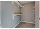 Walk-in closet with shelves and hanging rods at 7189 Lockford N, Avon, IN 46123