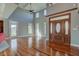 Bright living room with hardwood floors, high ceilings, and many windows at 7189 Lockford N, Avon, IN 46123
