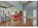 Living room with hardwood floors, high ceilings, and a fireplace at 7189 Lockford N, Avon, IN 46123