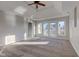 Main bedroom with high ceilings, carpeting, and access to balcony at 7189 Lockford N, Avon, IN 46123
