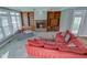 Spacious living room featuring a brick fireplace, built-in shelving, and comfortable seating at 7189 Lockford N, Avon, IN 46123