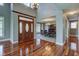 Spacious entryway with hardwood floors, high ceilings, and formal dining room at 7189 Lockford N, Avon, IN 46123
