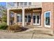 Covered patio with brick pillars and outdoor seating at 7189 Lockford N, Avon, IN 46123