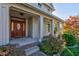 Elegant front door with sidelights and a brick stoop at 7189 Lockford N, Avon, IN 46123