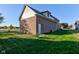 Brick garage with side yard and access door at 7189 Lockford N, Avon, IN 46123