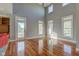 Bright and airy living room with hardwood floors and multiple windows at 7189 Lockford N, Avon, IN 46123