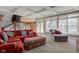 Spacious living room with sectional sofa, chaise lounge, built in shelving and fireplace at 7189 Lockford N, Avon, IN 46123