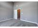 Spacious bedroom with grey walls and carpet flooring at 7189 Lockford N, Avon, IN 46123