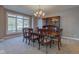 Formal dining room with hardwood floors, large window, and china cabinet at 7189 Lockford N, Avon, IN 46123
