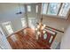 Two-story living room with hardwood floors and chandelier at 7189 Lockford N, Avon, IN 46123