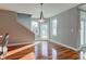 Sunlit dining area with hardwood floors and access to the outdoors at 7189 Lockford N, Avon, IN 46123