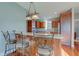 Kitchen features a breakfast bar with seating and wood cabinetry at 7189 Lockford N, Avon, IN 46123