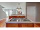 Kitchen features gas cooktop and island with additional cabinetry at 7189 Lockford N, Avon, IN 46123