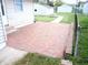 Brick patio adjacent to the house, ideal for outdoor relaxation at 309 S Fleming St, Indianapolis, IN 46241