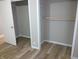 Spacious closet with wood shelving and neutral walls at 309 S Fleming St, Indianapolis, IN 46241