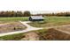 Aerial view of a dark barn and surrounding fields at 345 S 775 E, Zionsville, IN 46077