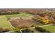 Aerial view of property with barns and land showing fall colors at 345 S 775 E, Zionsville, IN 46077