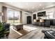 Living area with kitchen, sliding glass doors, and hardwood floors at 345 S 775 E, Zionsville, IN 46077