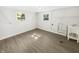 Bright laundry room with vinyl flooring and utility sink at 926 Stockton St, Indianapolis, IN 46260