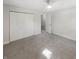 Charming bedroom with grey carpet and triple door closet at 926 Stockton St, Indianapolis, IN 46260