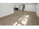 Spacious living room with hardwood floors and access to other rooms at 926 Stockton St, Indianapolis, IN 46260