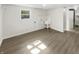 Laundry room featuring vinyl flooring and access to a full bathroom at 926 Stockton St, Indianapolis, IN 46260