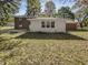 Home's backyard with detached shed and lawn at 926 Stockton St, Indianapolis, IN 46260