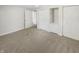 Spacious bedroom with ample closet space and neutral carpeting at 926 Stockton St, Indianapolis, IN 46260