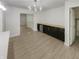 Dining area with hardwood floors and dark cabinetry at 926 Stockton St, Indianapolis, IN 46260