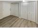 Bright entryway with hardwood floors and double door closets at 926 Stockton St, Indianapolis, IN 46260