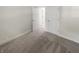 Simple bedroom with plush carpeting and two closets at 926 Stockton St, Indianapolis, IN 46260