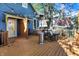 Deck with patio furniture and heater, near house entrance at 1007 Broadway St, Indianapolis, IN 46202