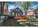 Blue house with deck and landscaped yard at 1007 Broadway St, Indianapolis, IN 46202