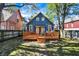 Blue house with deck and landscaped yard at 1007 Broadway St, Indianapolis, IN 46202