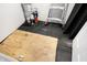 Unfinished basement area with storage and access panel at 1007 Broadway St, Indianapolis, IN 46202