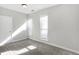 Well-lit bedroom with neutral walls and carpet floors at 1007 Broadway St, Indianapolis, IN 46202