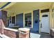 Enticing front porch with brick details and a welcoming entrance at 1007 Broadway St, Indianapolis, IN 46202