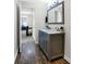 Updated bathroom with double vanity and marble countertop at 1007 Broadway St, Indianapolis, IN 46202