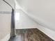 Bright bathroom with wood flooring and white subway tile at 1007 Broadway St, Indianapolis, IN 46202